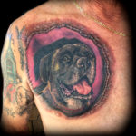 chest dog tattoo