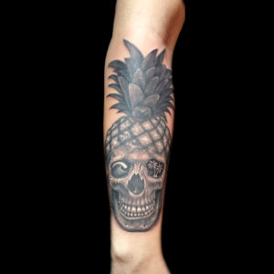 pineapple skull beach palm tree wave tattoo