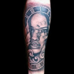black and grey realism tattoo