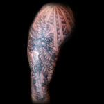 angels fighting demons on horse tattoo