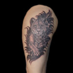 lioness and cub realism tattoo